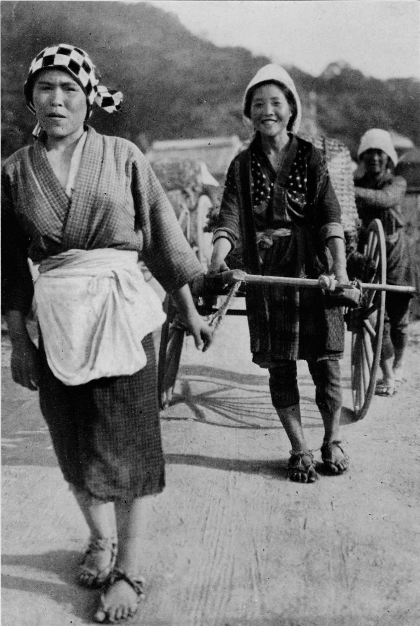 Three generations of women moving a cart with grandmother at the rear, pushing, c. 1900, 1921 by Julian Leonard Street