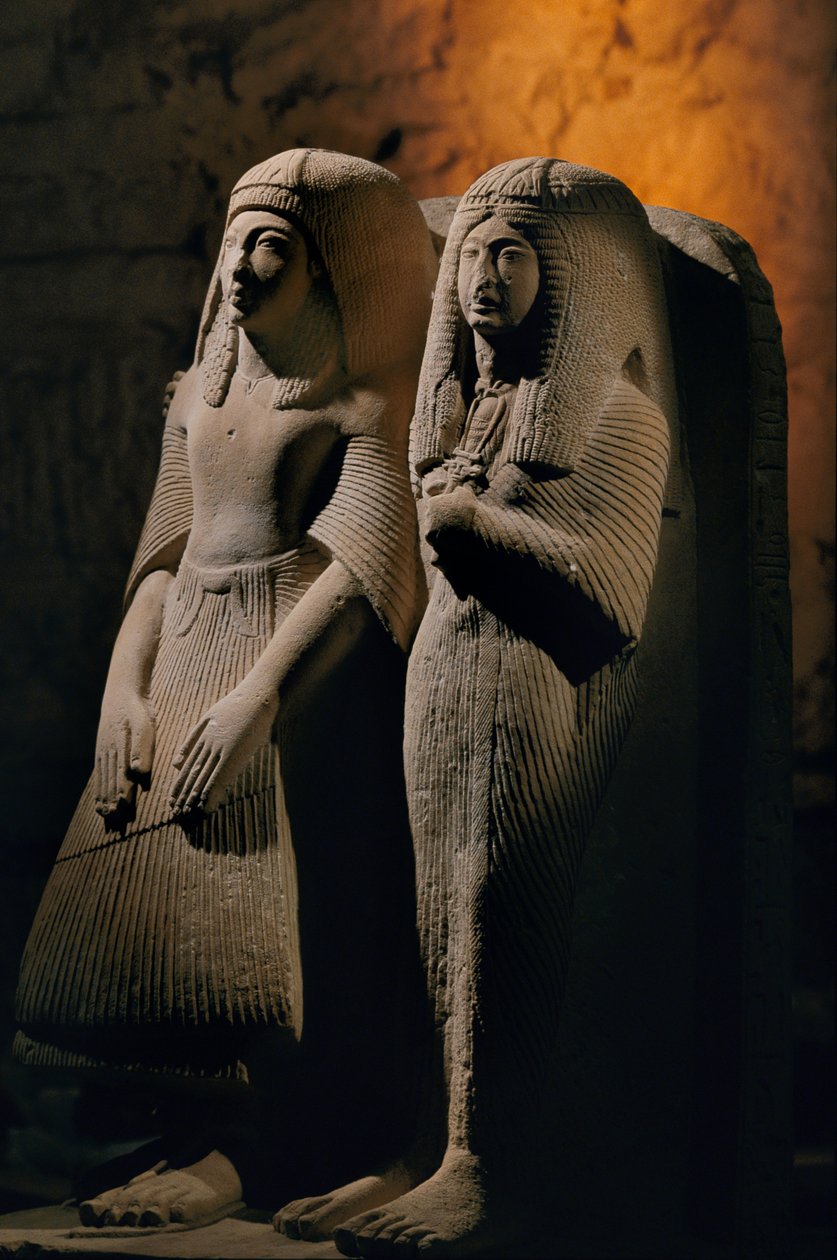 Limestone double statue of a priest named Amenemipet and his wife, New Kingdom by Kenneth Garrett