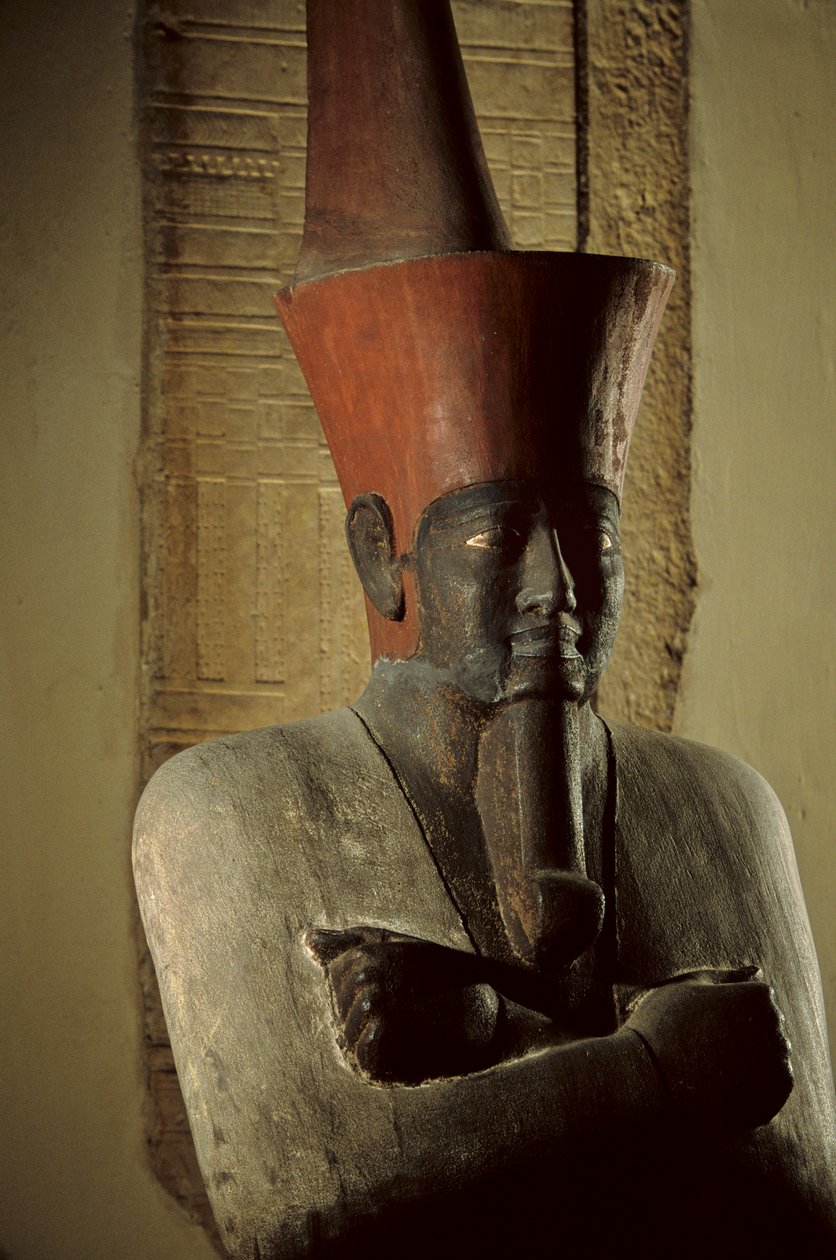 Painted sandstone statue of Pharaoh Nebhepetre Mentuhotep II wearing red crown of Lower Egypt, 2002 (photo) by Kenneth Garrett