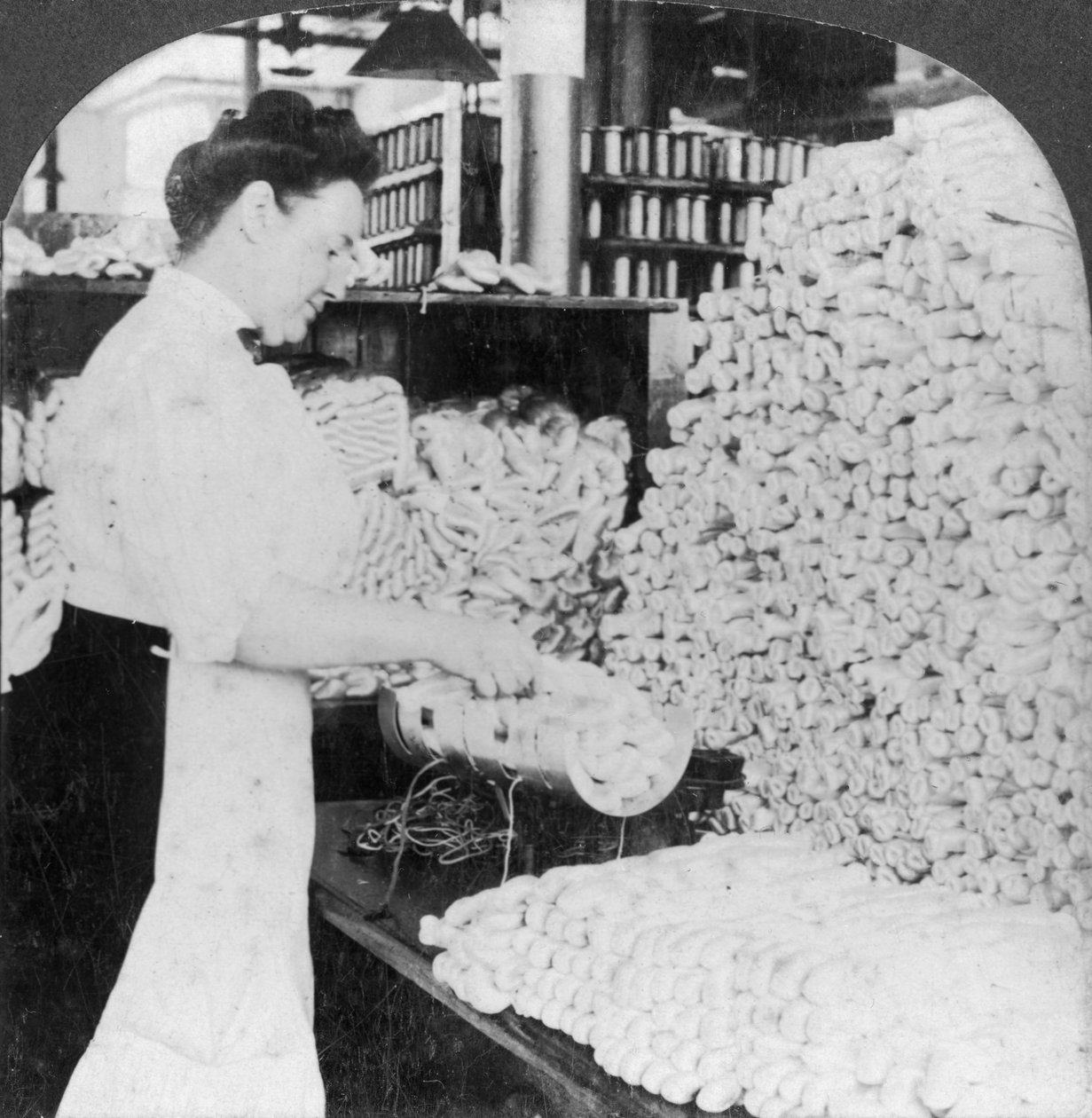 Weighing and sorting raw silk skeins, South Manchester, Connecticut, USA by Keystone View Company