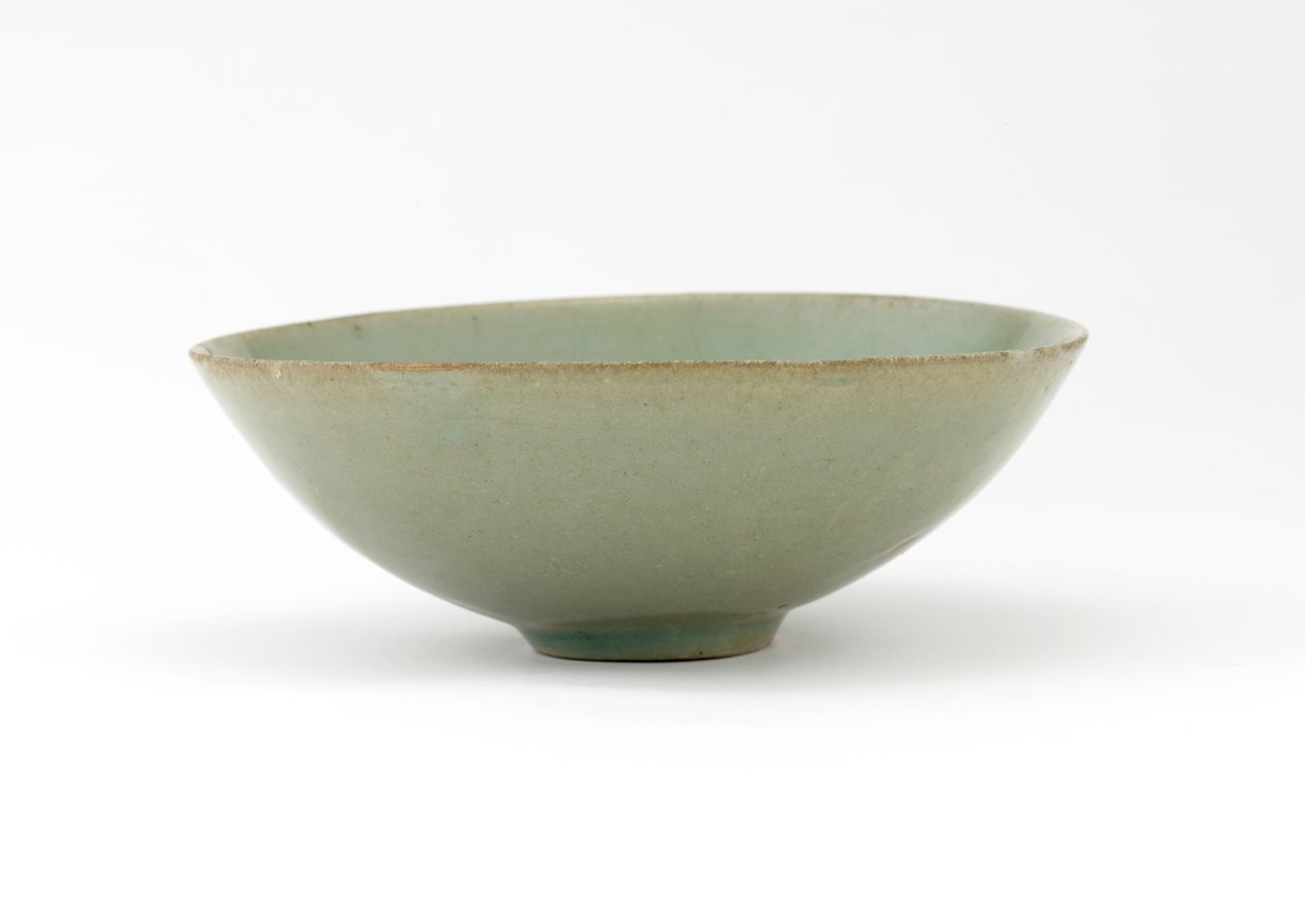 Bowl with molded design of fish among waves by Korean School