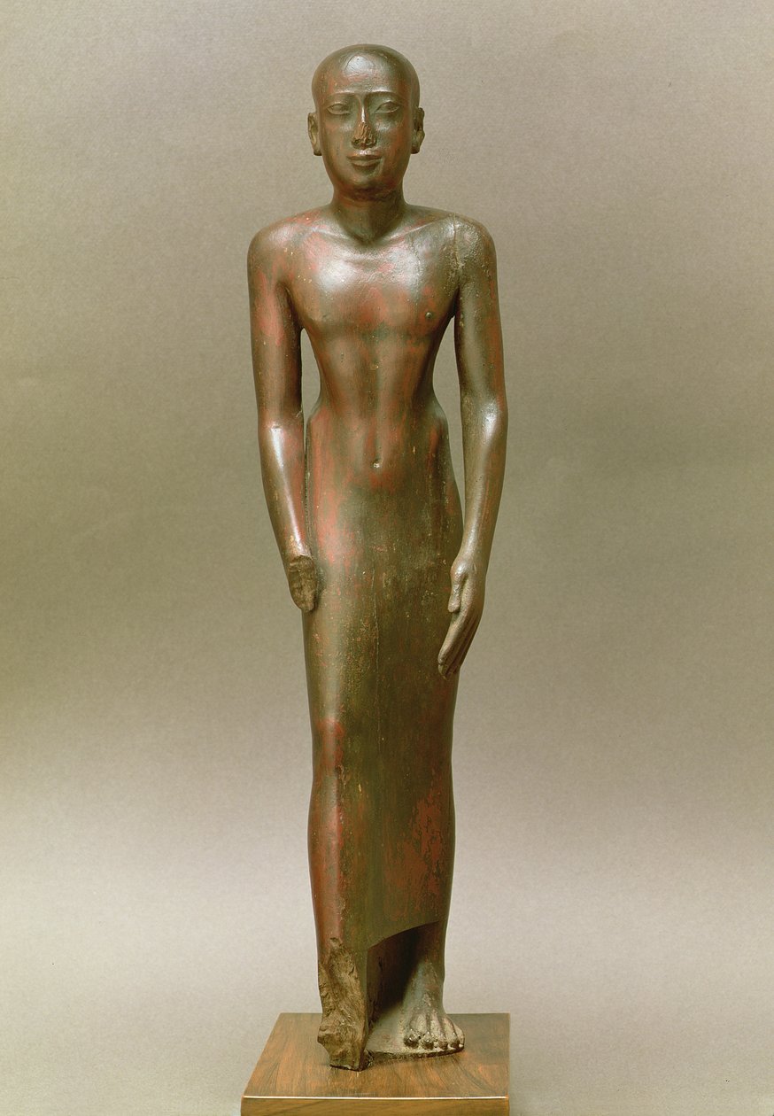 Statue of a standing male by Late Period Egyptian