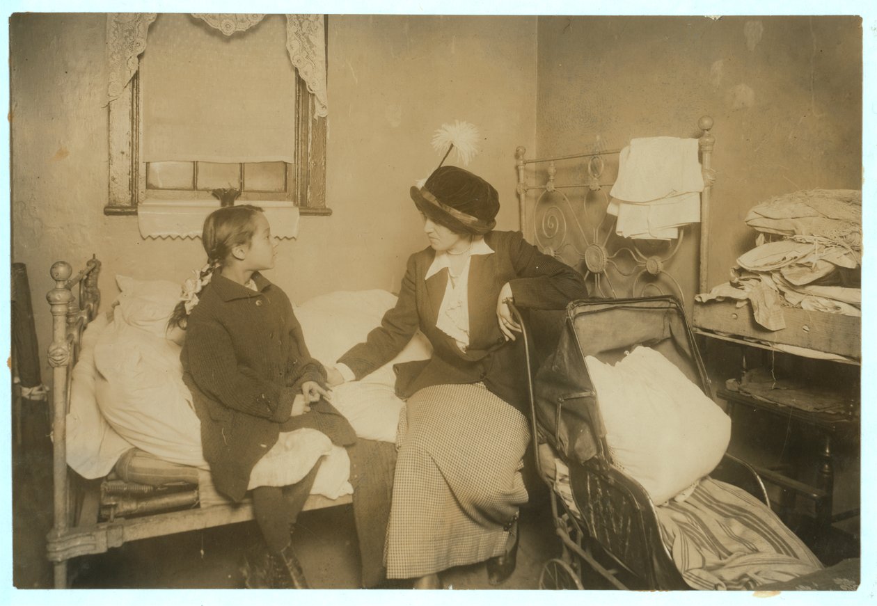 Investigator Talking with Ida List, 124 Ridge Street, New York, 16th September 1913 by Lewis Wickes Hine