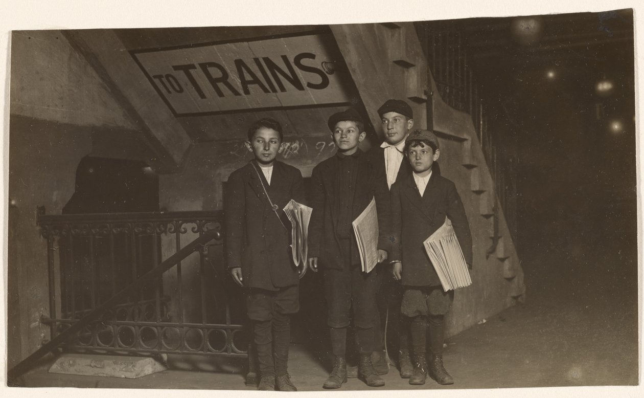 Four Newsies at an Entrance to the Subway, New York City by Lewis W. Hine