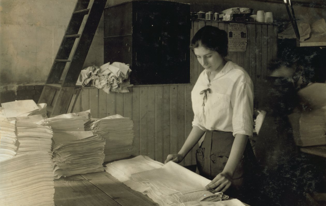 15-Year-Old Girl Folding Towels in Bonanno Laundry, Boston, Massachusetts by Lewis Wickes Hine