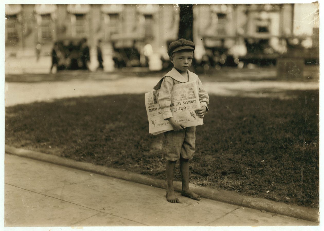 7 year old newsboy Ferris in Mobile, Alabama, 1914 by Lewis Wickes Hine