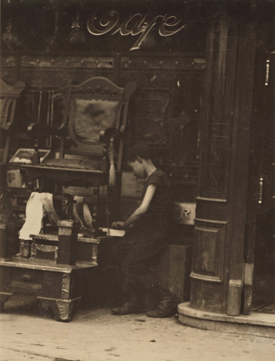 Young Bootblack Working on Canal Street, New York City by Lewis Wickes Hine