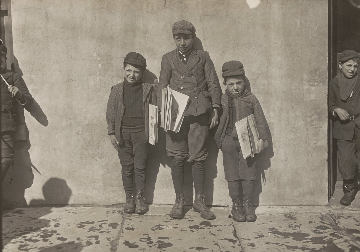 John Pento, 14 years old, Daniel and Angelo Pento, 7 years old, selling newspapers by Lewis Wickes Hine