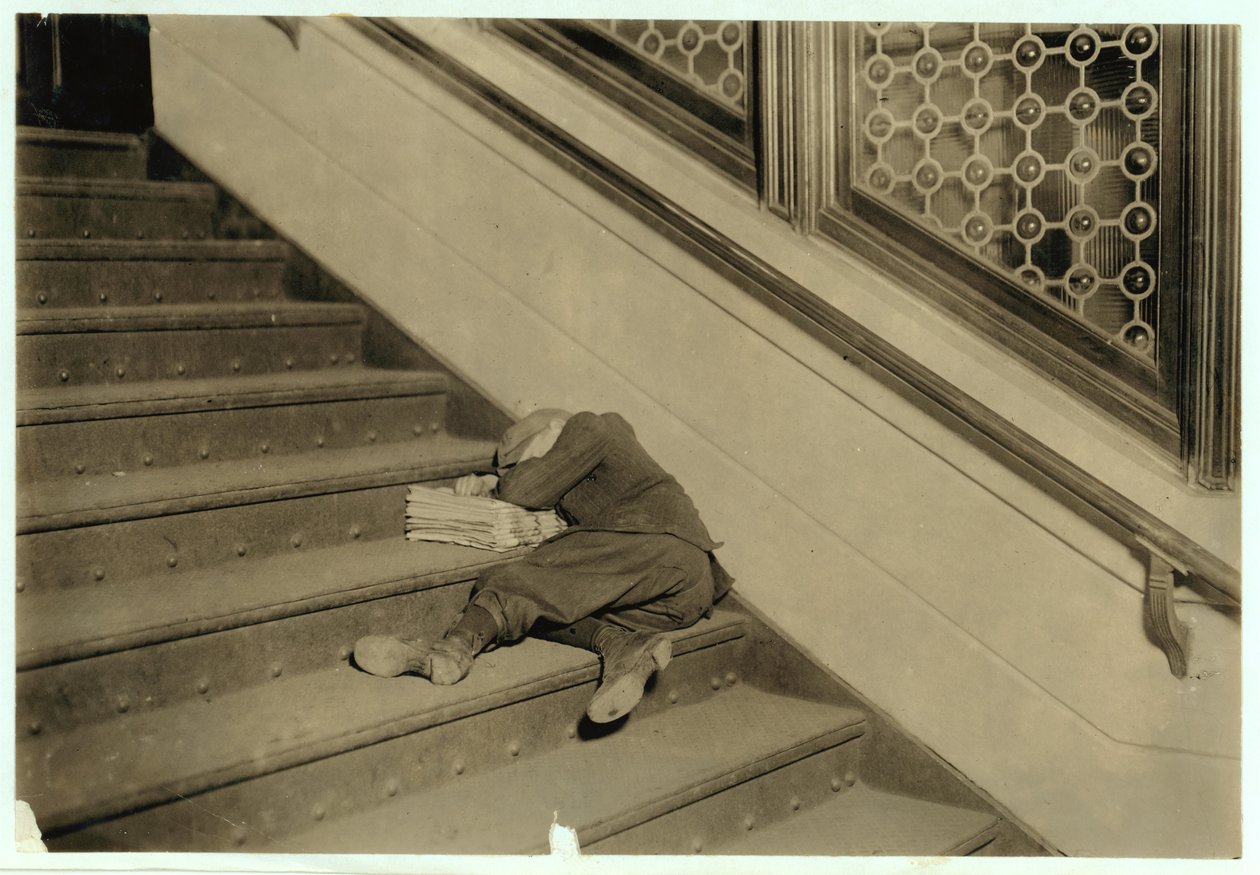 Newsboy Asleep with His Papers in Jersey City, New Jersey, 1912 by Lewis Wickes Hine