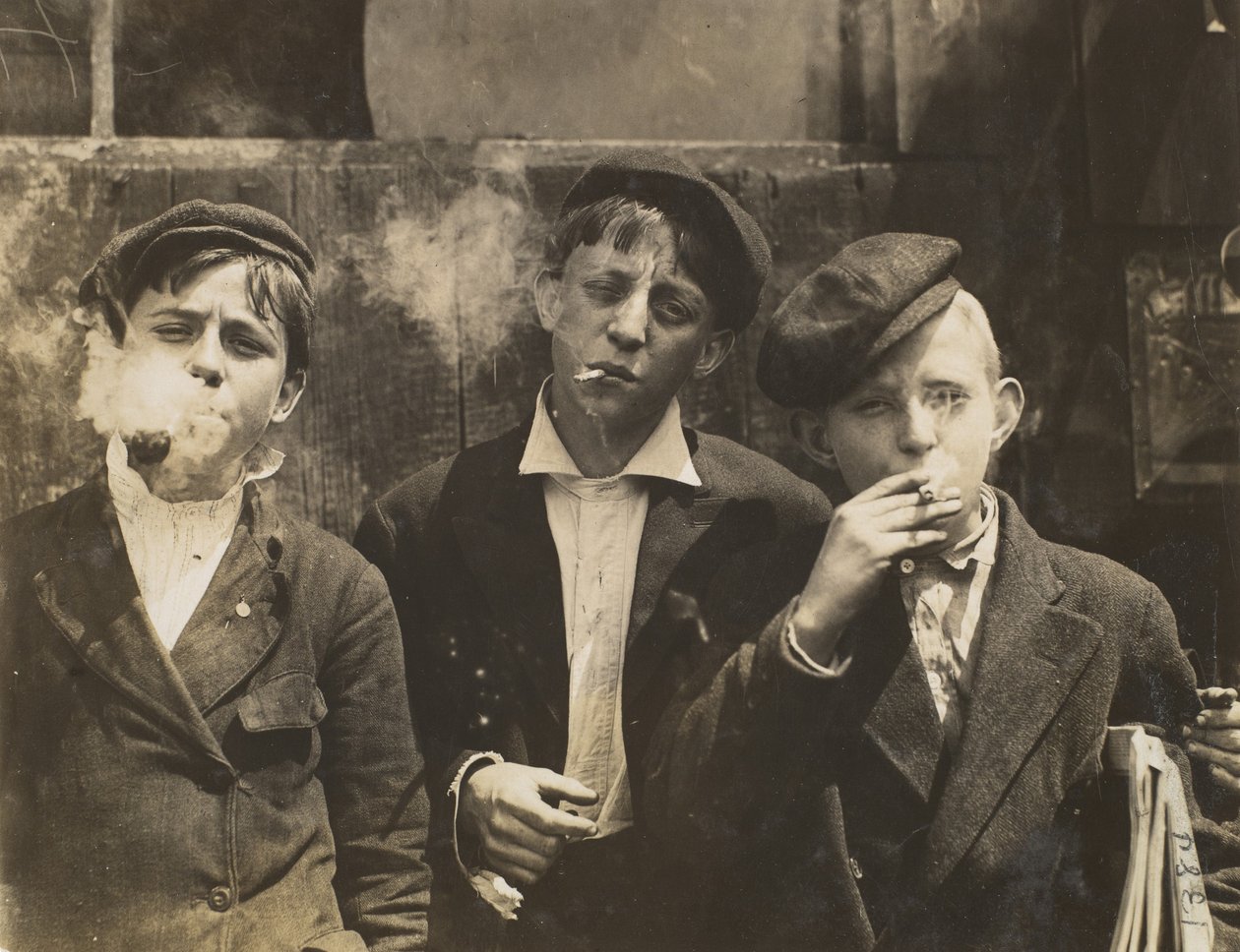 Three Young Newsboys Smoking, Saint Louis, Missouri, USA by Lewis Wickes Hine