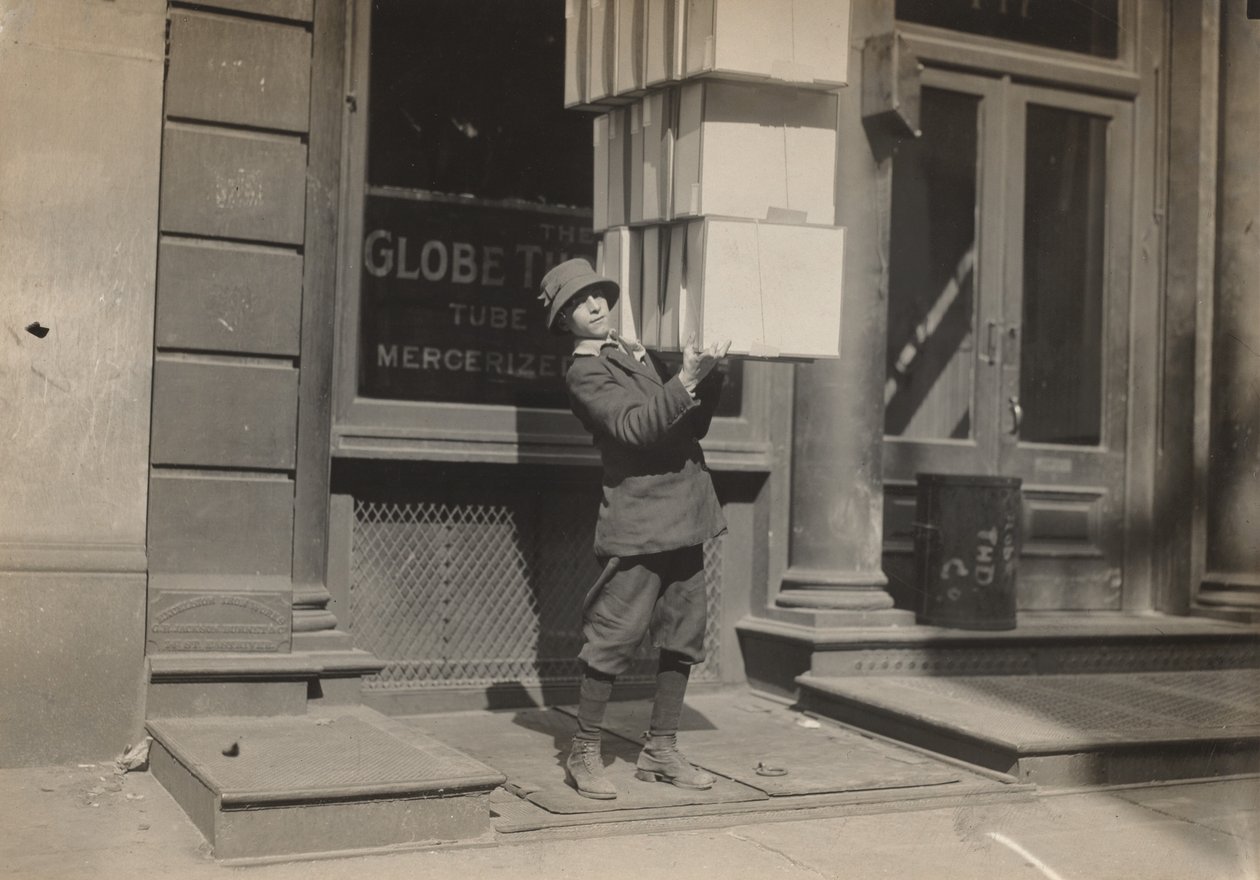Wagon Boy or Tail Boy Helping to Load the Wagon by Lewis Wickes Hine
