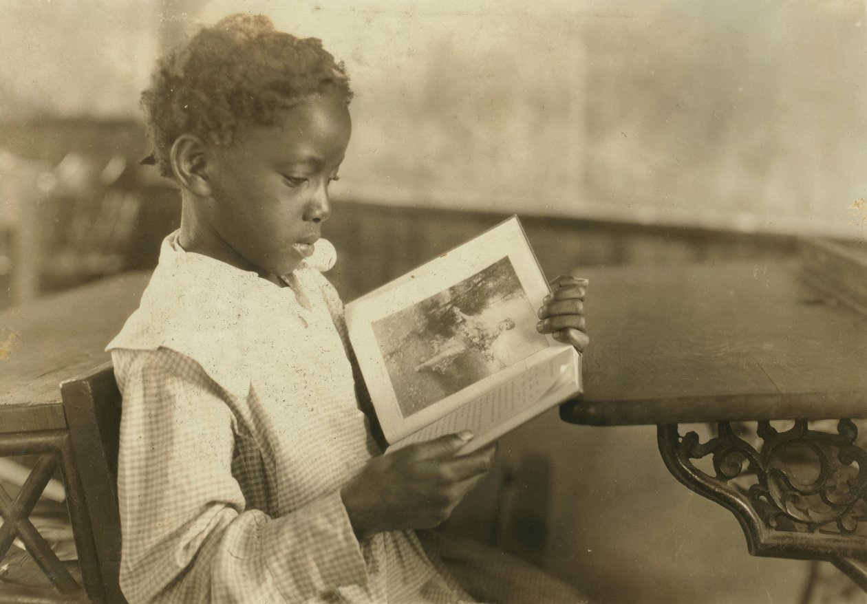 Young Girl Reading Book in Classroom, Pleasant Green School, Marlinton, Pocahontas County, West Virginia, USA, c.1921 by Lewis Wickes Hine