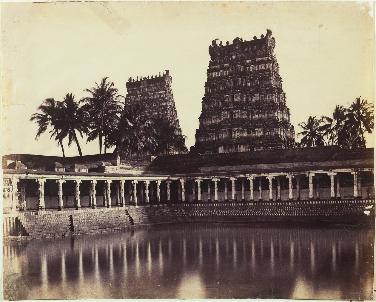 Madura. The Great Pagoda, Mootoo Alaghur and East Gopurum from Tank by Linnaeus Tripe