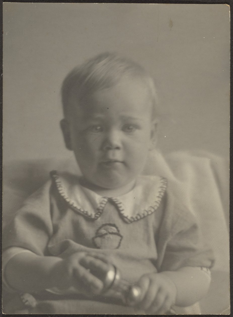 Baby Holding a Silver Rattle by Louis Fleckenstein