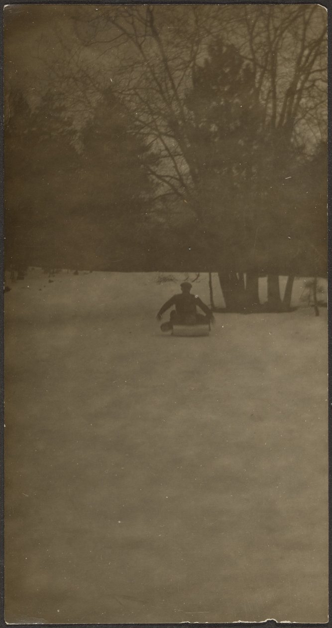 Figure on Sled in Snow by Louis Fleckenstein