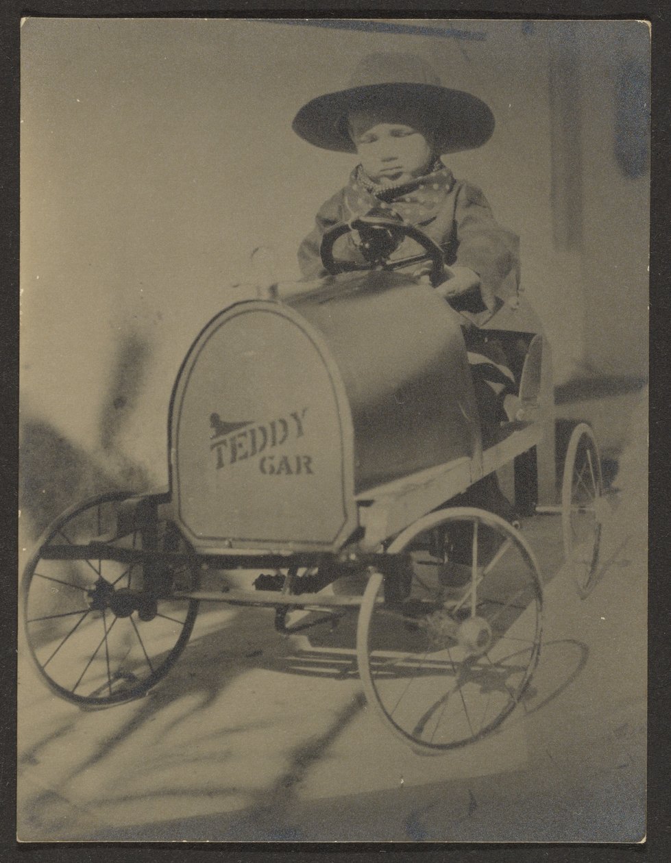 Little Boy Seated in Teddy Car by Louis Fleckenstein