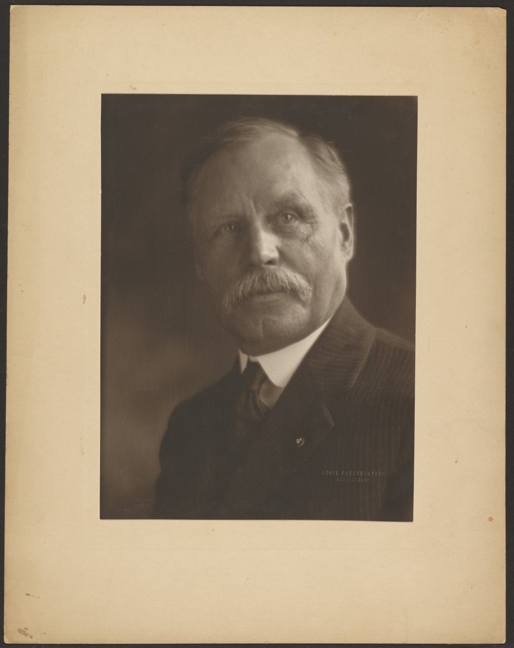 Portrait of a Man with Metal Lapel Pin by Louis Fleckenstein