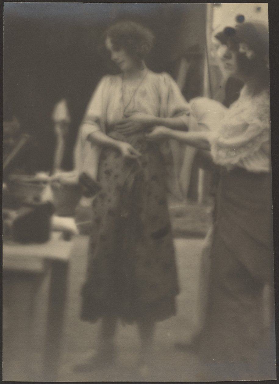 Two Women Standing in Studio by Louis Fleckenstein