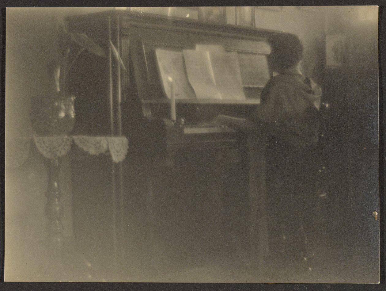 Woman Playing Piano by Louis Fleckenstein