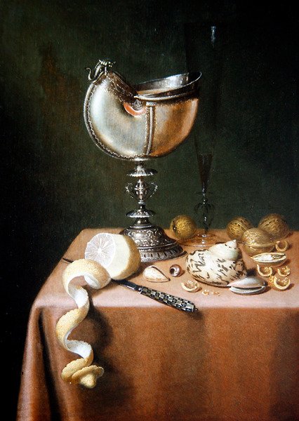 A Still Life with a Nautilus Cup, a peeled Lemon and Walnuts by Maerten Boelema de Stomme