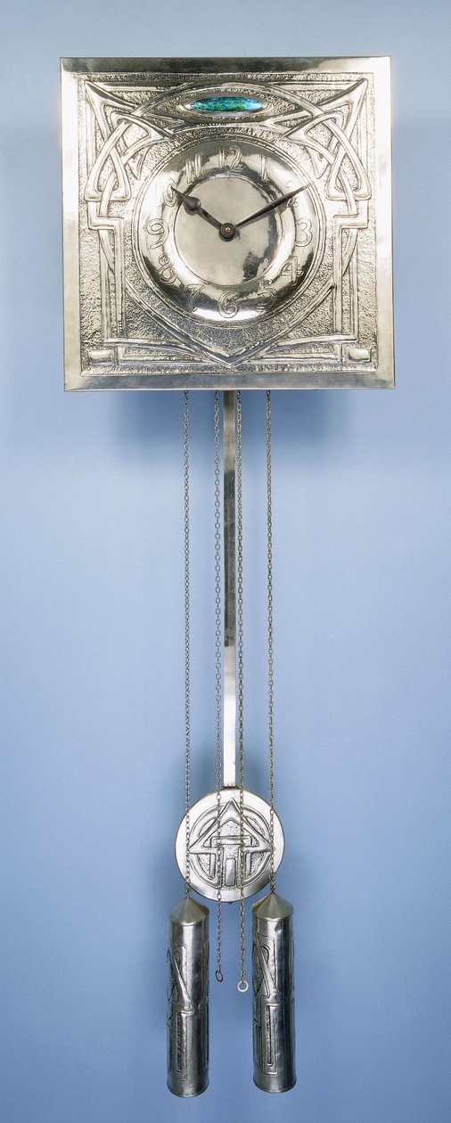 A wall clock by Margaret Gilmour, decorated in repousse with Celtic entrelac designs by Margaret Gilmour