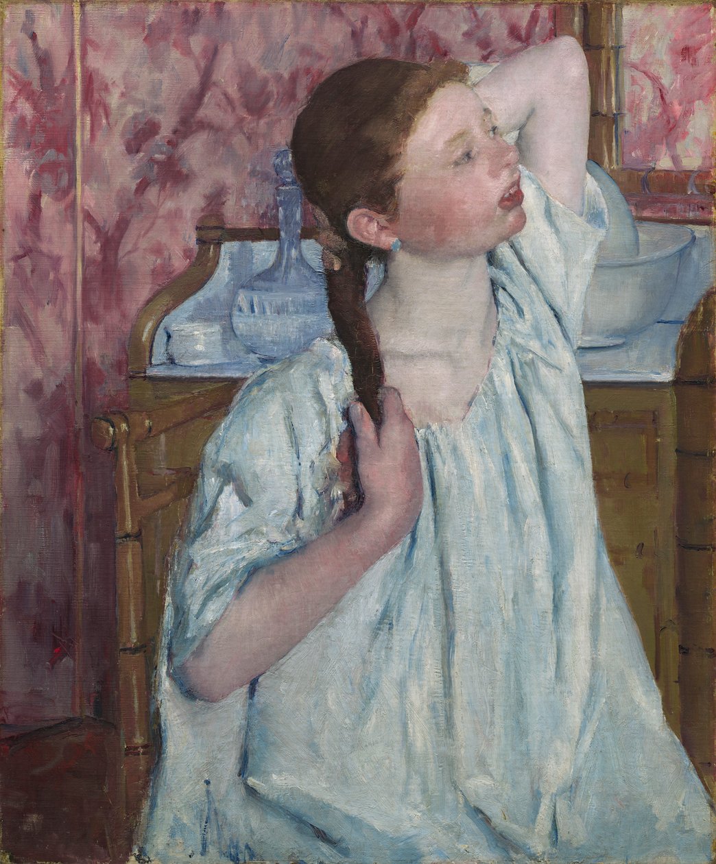 Girl Arranging Her Hair by Mary Stevenson Cassatt