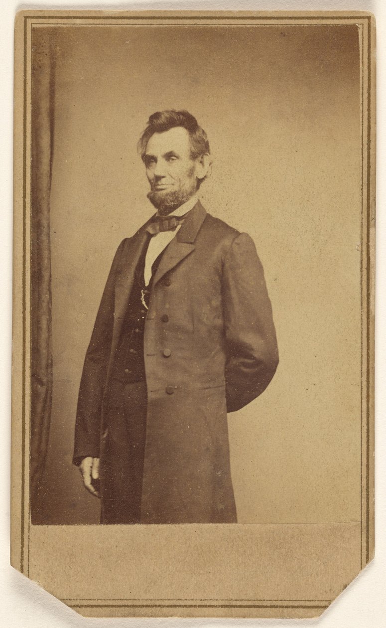 Abraham Lincoln standing with one arm behind his back by Mathew B. Brady
