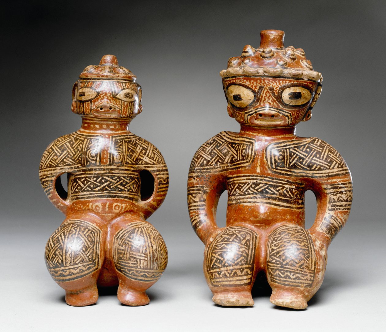 Two seated figures, Nosara, Nicoya by Mesoamerican