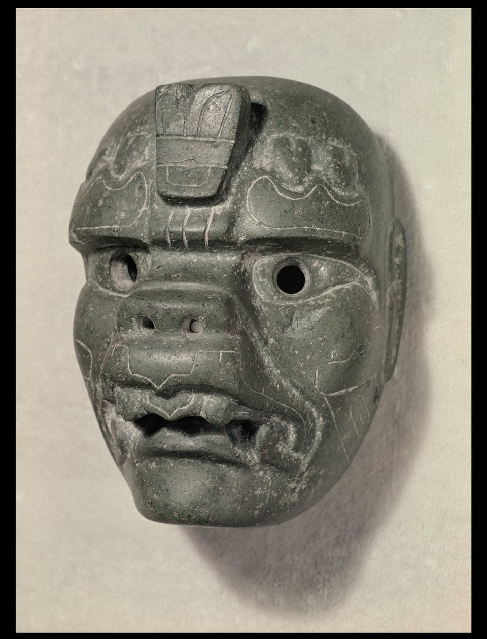 Feline mask of a man, from Oaxaca, Pre-Columbian by Mexican School
