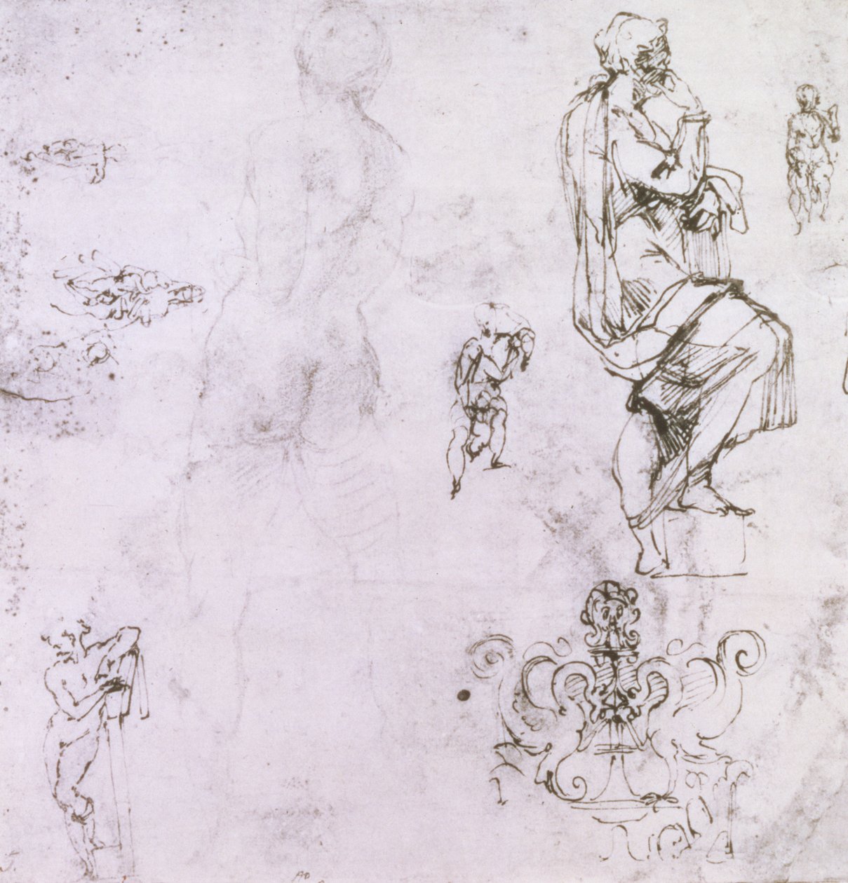 Sketches of male nudes, a madonna and child and a decorative emblem by Michelangelo Buonarroti