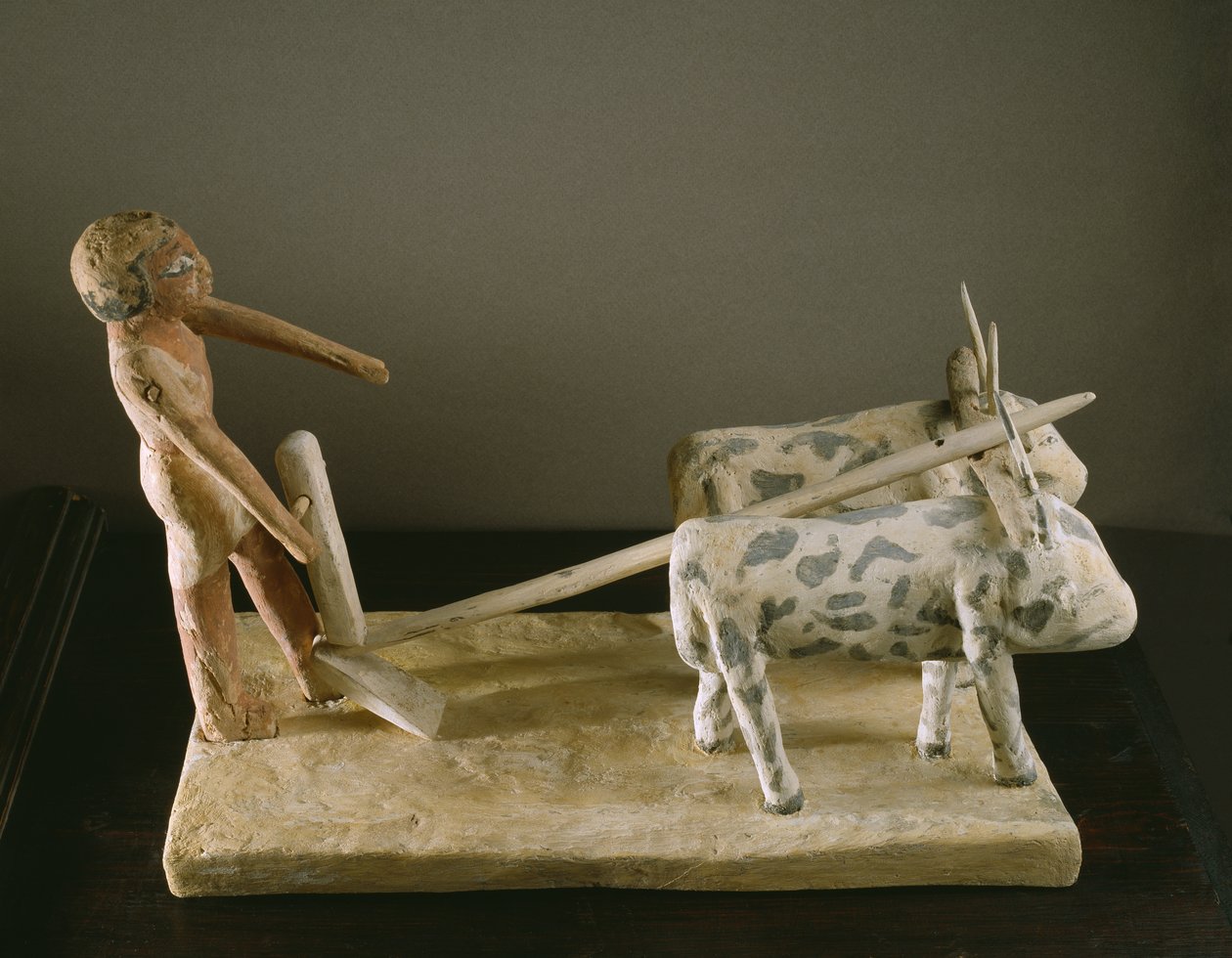 Funerary model of a ploughman leading his plough drawn by two oxen by Middle Kingdom Egyptian