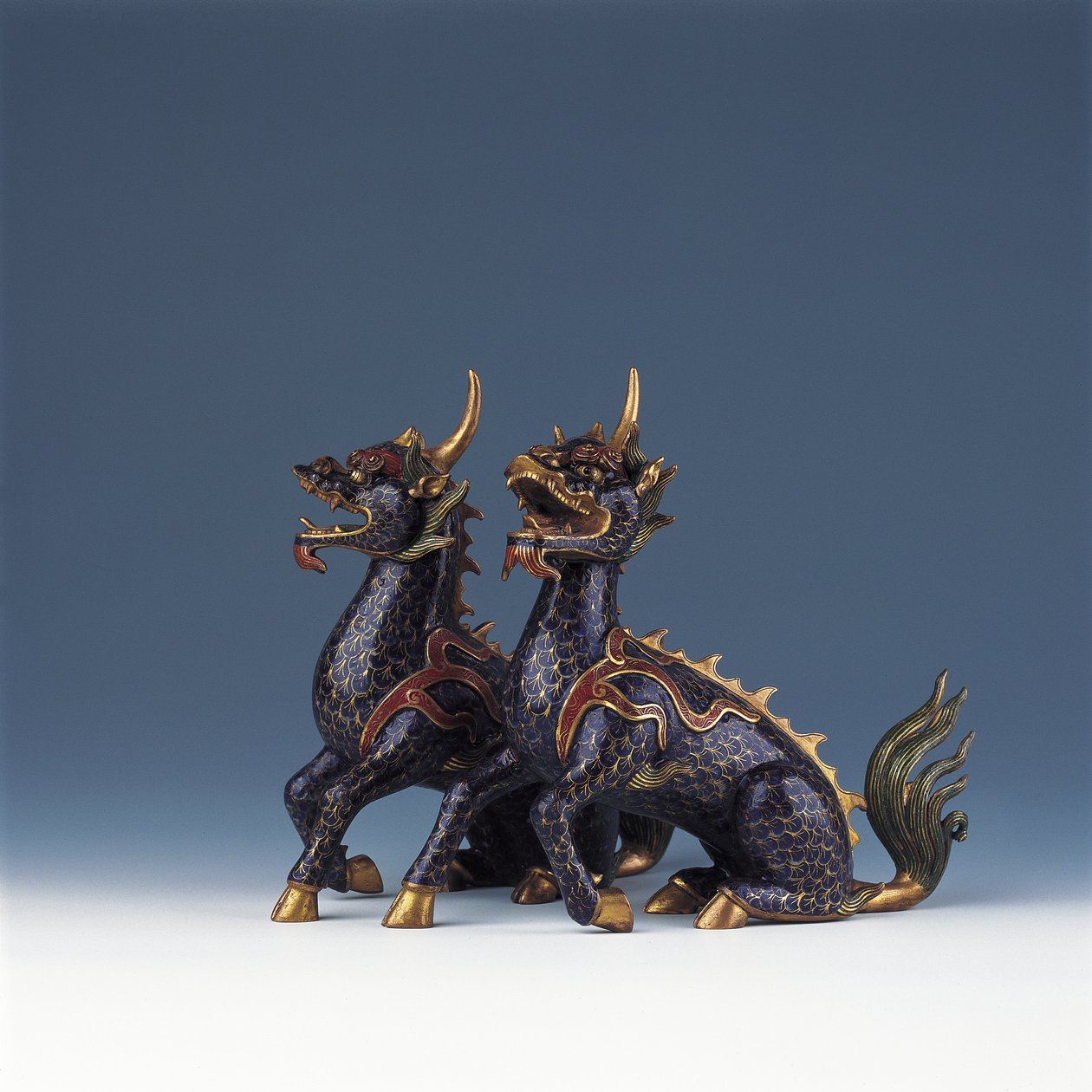 A Pair of Seated Qilin by Ming Dynasty   Wanli Period Chinese School