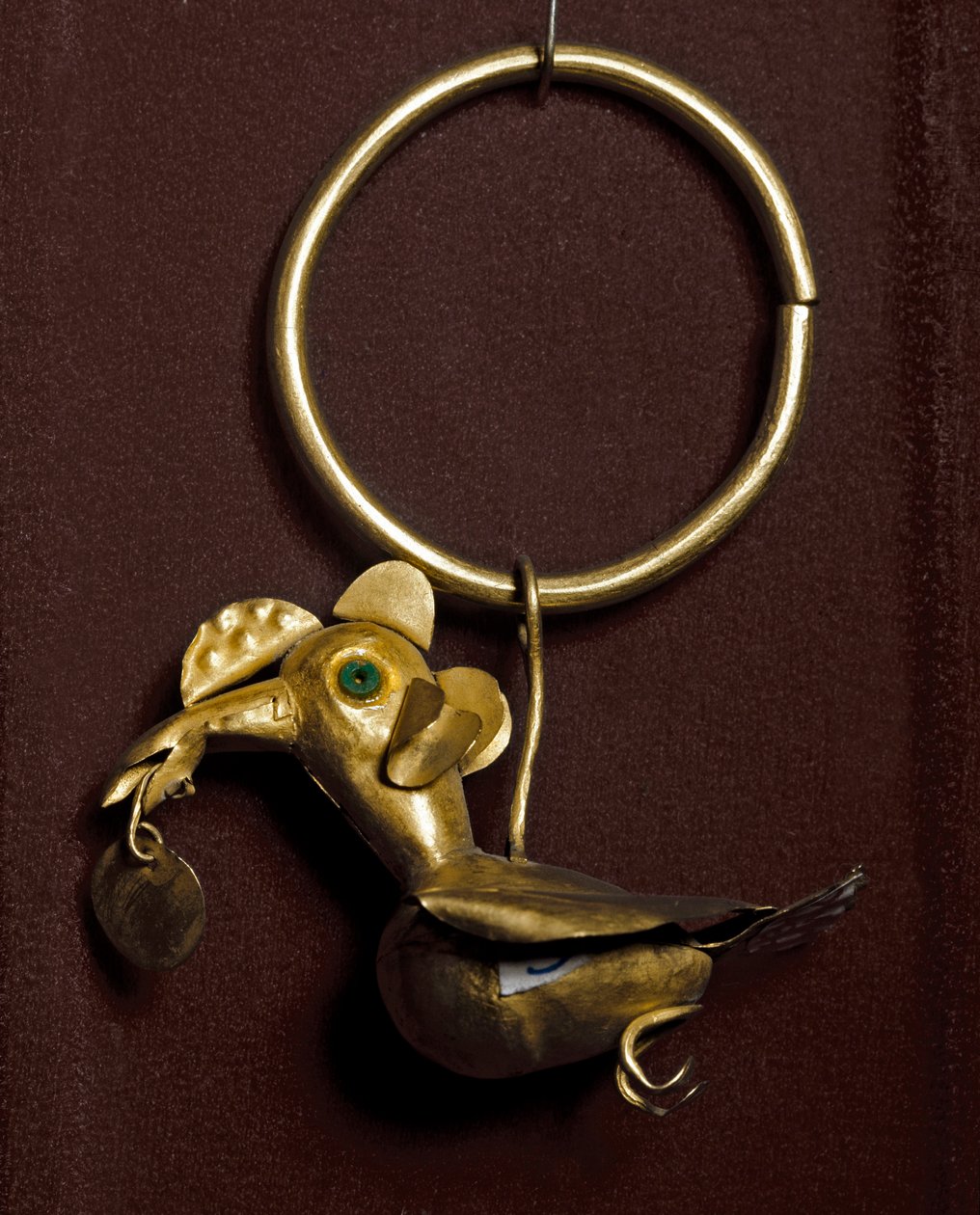 Precolombian art, Mochica culture: earring with bird in gold. 200-500 AD by Moche Moche