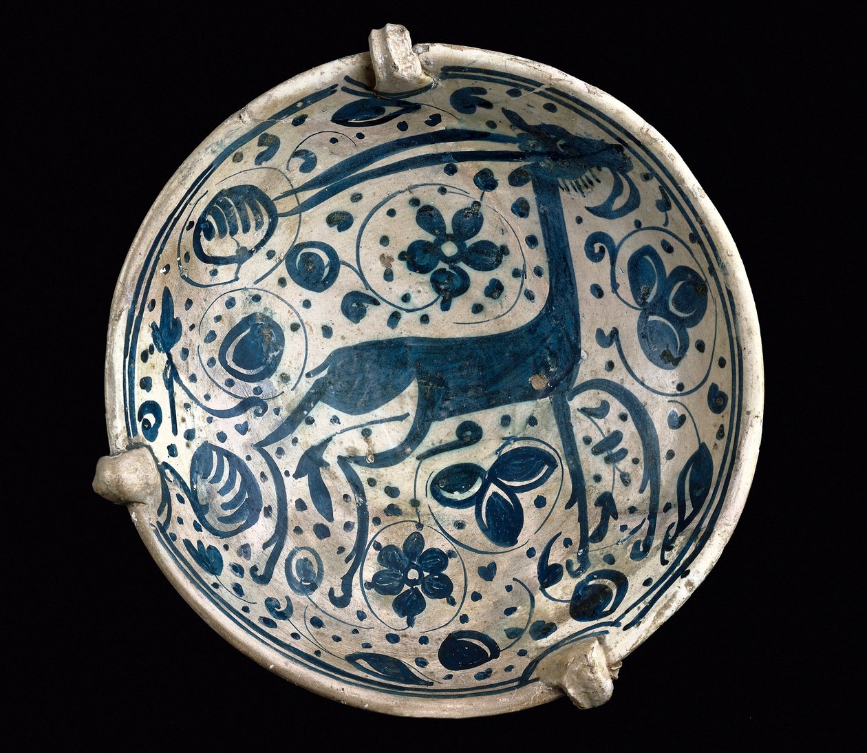 Art mudejar: ceramic cup azul, decorated with a deer of Paterna, Manises (Hispano-Moorish style). 14th or 15th century by Mudejar School