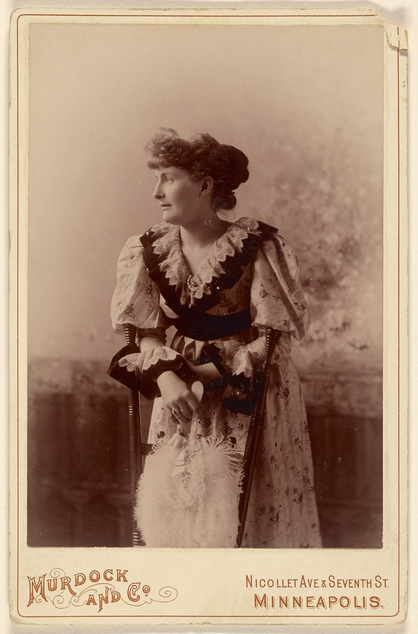 Unidentified Woman in Profile with Feather Fan by Murdock and Company