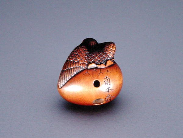 Netsuke, depicting crow emerging from an egg by Nambokusai Nambokusai