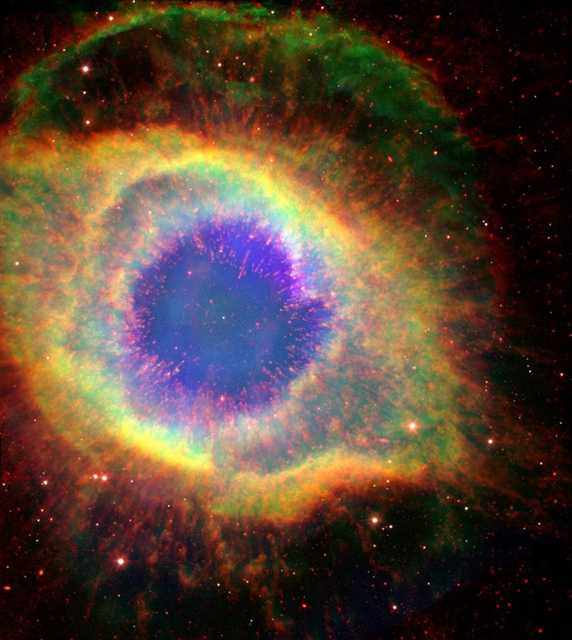 The Helix Nebula (NGC 7293), sometimes called The Eye of God, a large planetary nebula in the constellation Aquarius. Credit: NASA. by National Aeronautics and Space Administration National Aeronautics and Space Administration