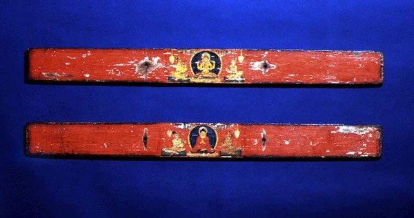 Sutra covers depicting a seated Bodhisattva (Prajnaparamita) and Buddha surrounded by a mandorla by Nepalese School