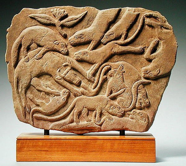 Relief depicting dogs felling a cow, 4th-5th century by Nubian Nubian