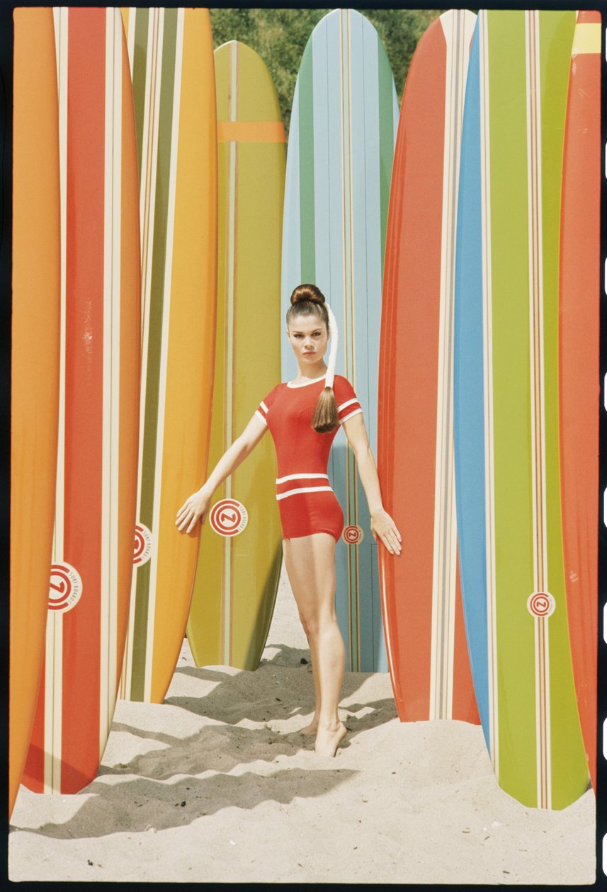 Actress Wende Wagner with surfboards on the beach in Malibu by Orlando Suero