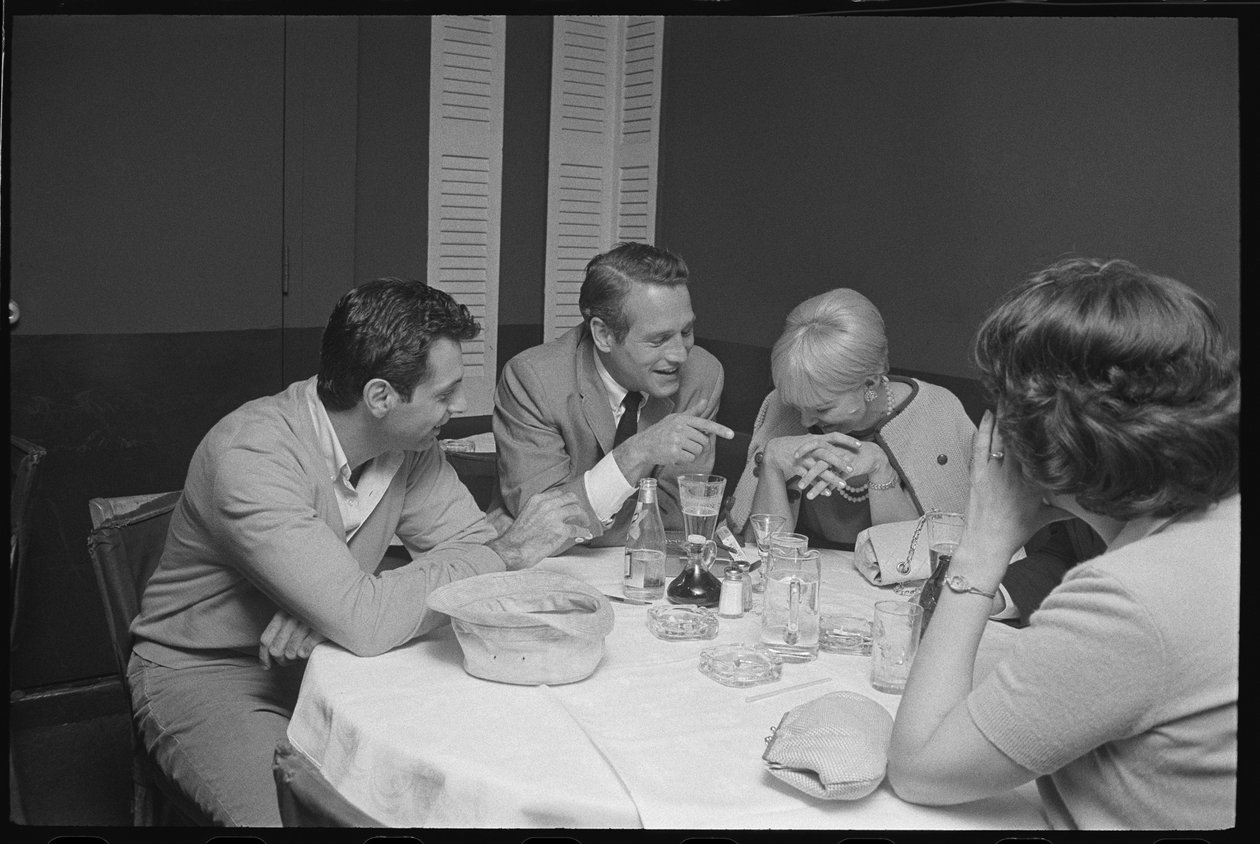 Paul Newman, Mort Sahl and Joanne Woodward Joking at Dinner by Orlando Suero
