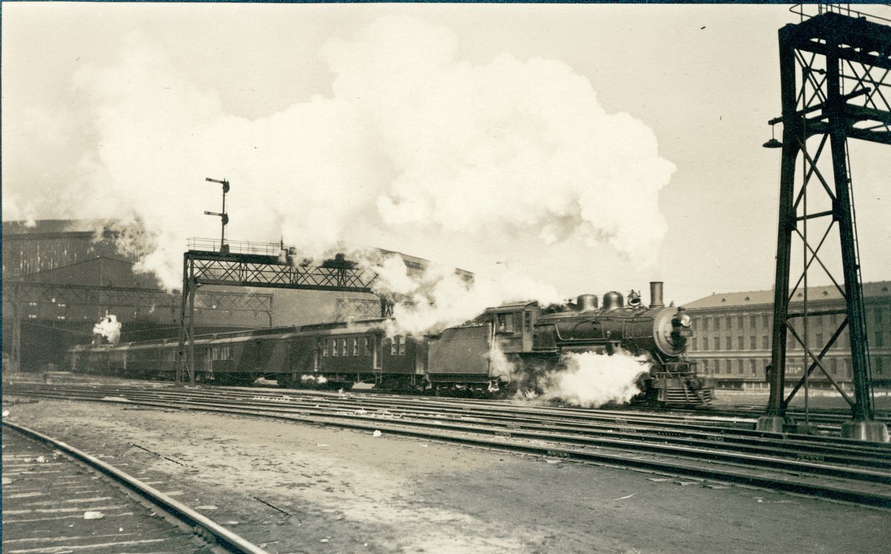 Railroad train leaving Union Station, St. Louis by Oscar C. Kuehn