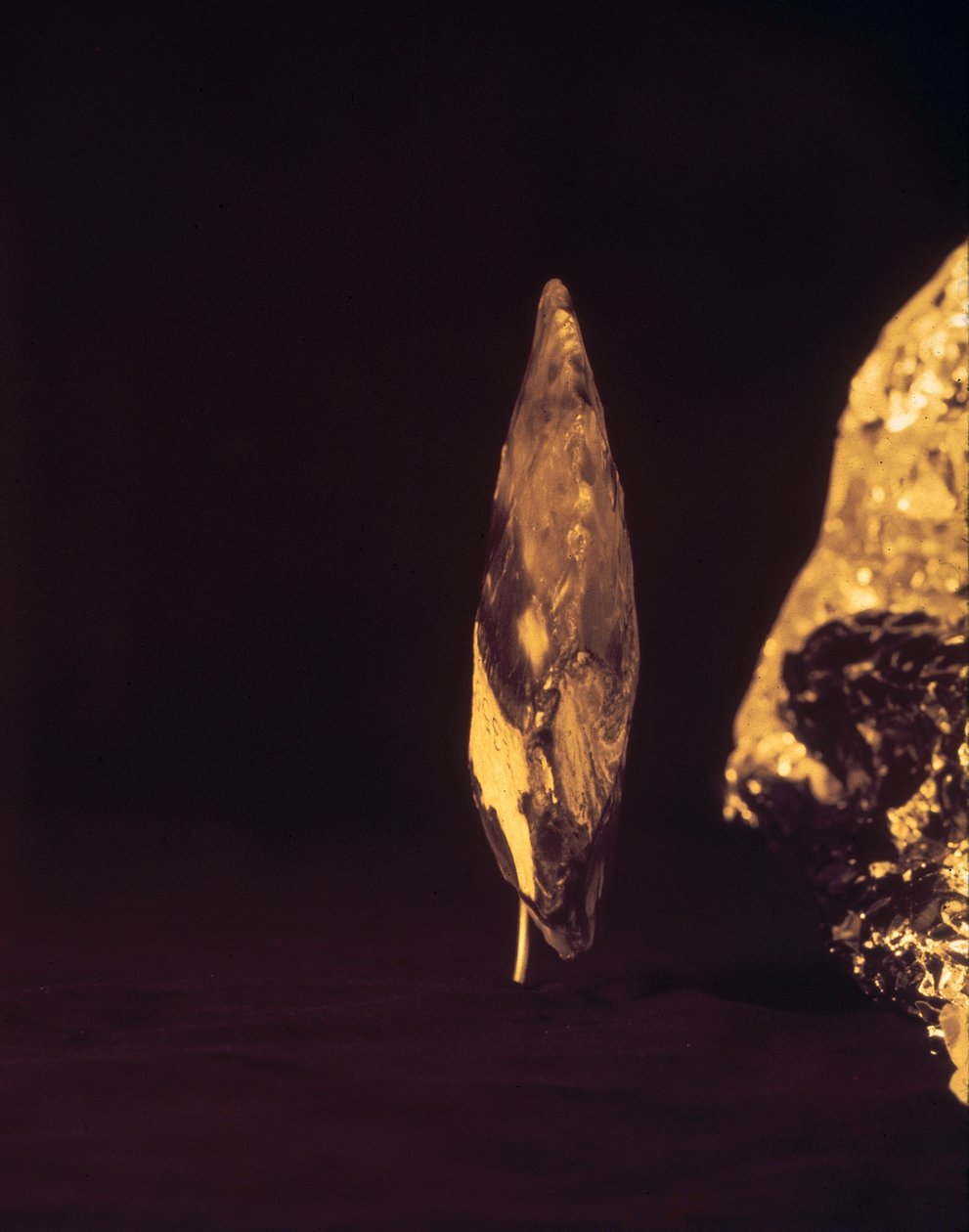 Knapped axe or spear head by Paleolithic