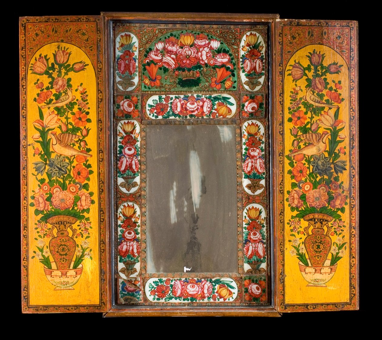 A large Qadjar polychrome lacquered Mirror, with the doors open to reveal the decorated interior by Persian School