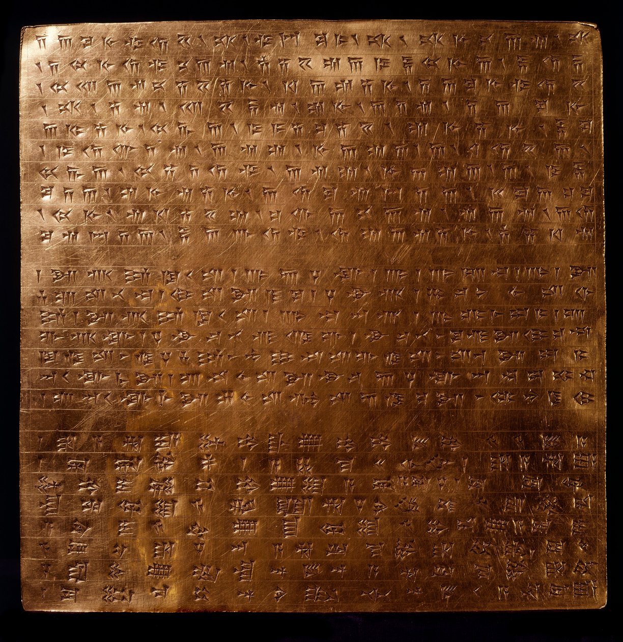 Persian Empire: gold plate of king Darius I (550-486 BC) engraved with inscriptions in cuneiform writing, 550-500 BC, from Persepolis, Archeological Museum, Teheran by Persian School