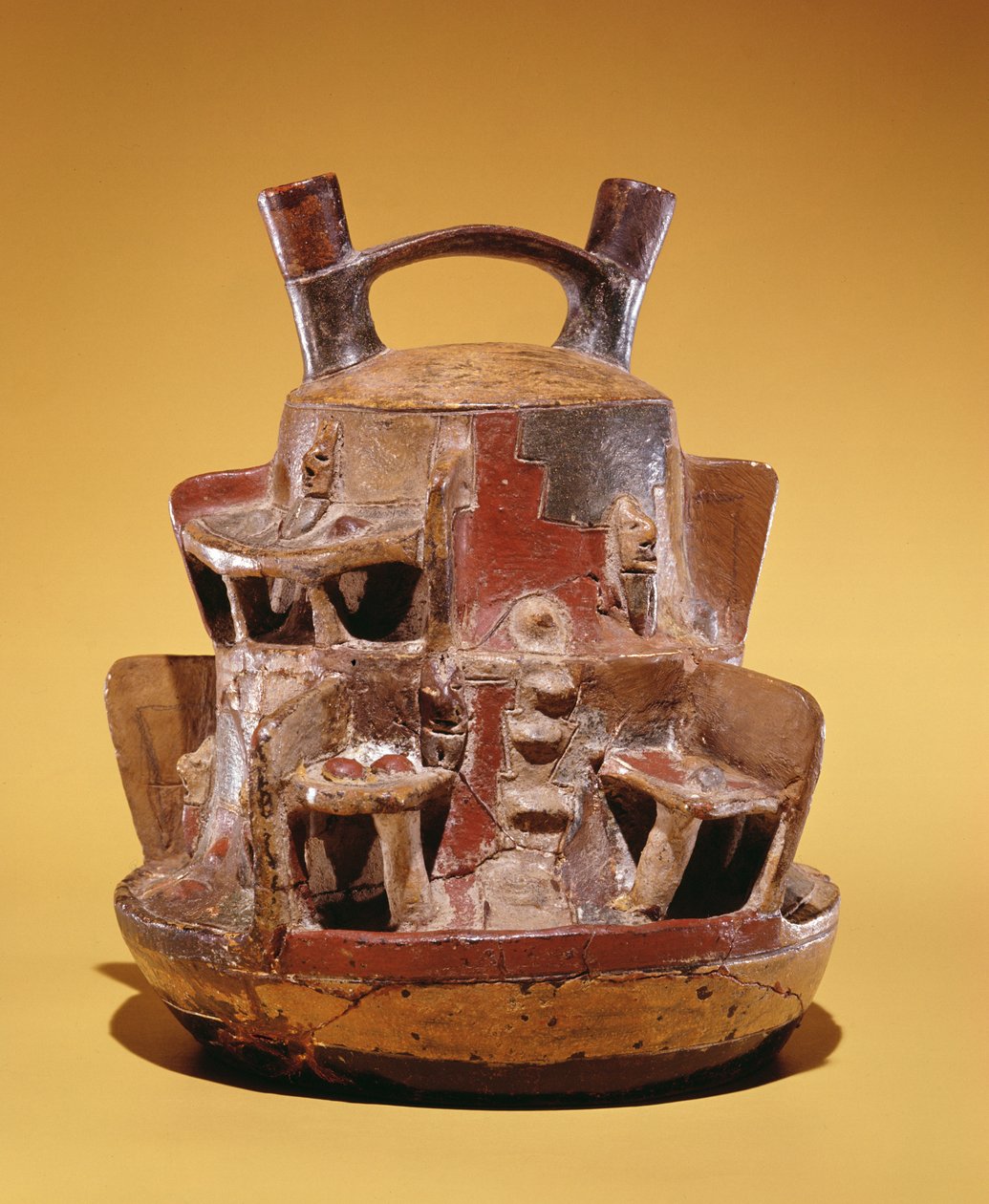 Pottery vessel depicting houses nestled into the Andes by Peruvian School