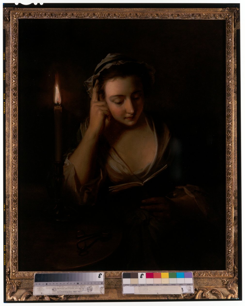 A young girl reading by candlelight by Philippe Mercier