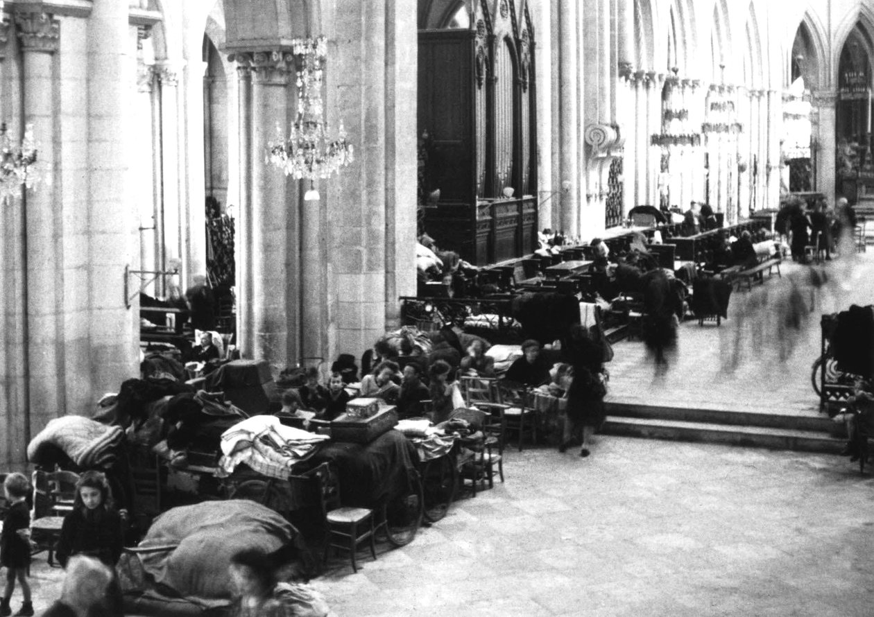 People taking refuge in Caen Cathedral, July 1944 by Photographer French