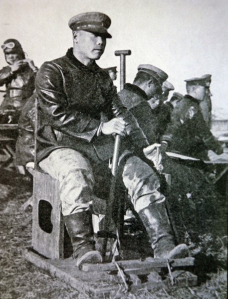 Japanese Pilots in Basic Training, Using Wooden Joystick, Rudder Bar and Throttle by Photographer Japanese