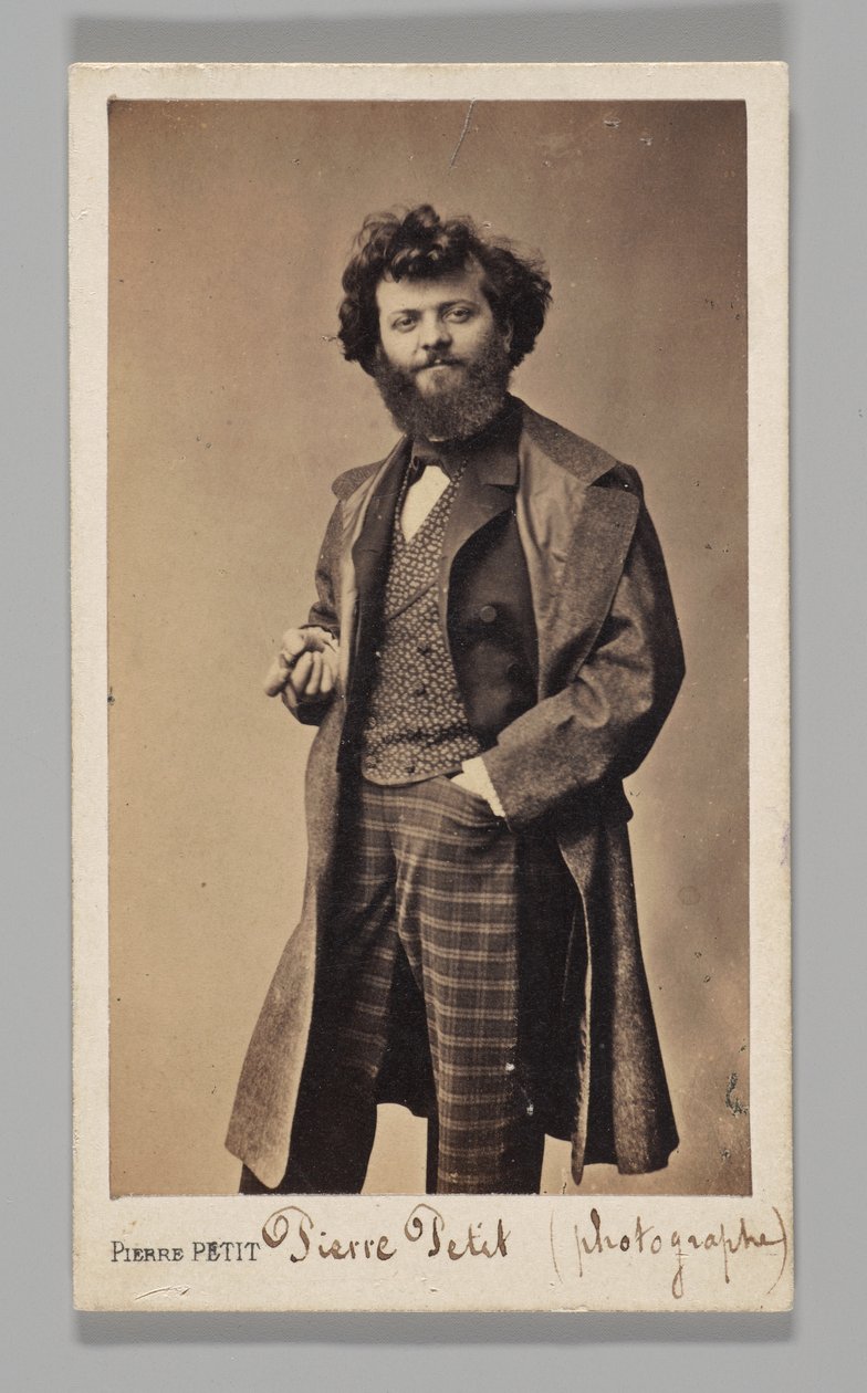 Studio Portrait: Self-Portrait Wearing Plaid Pants and Overcoat by Pierre Petit